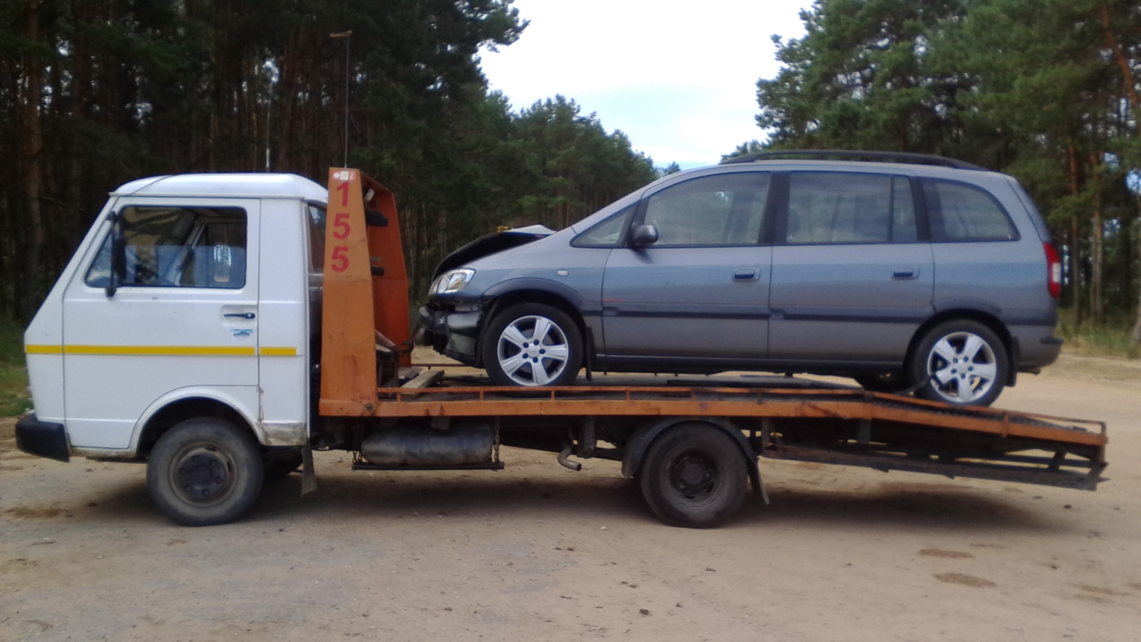 Evakuator VW LT 45 perevozka minivena