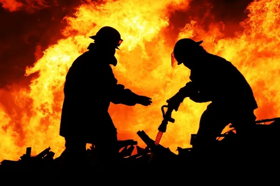 depositphotos 8955368 stock photo two fire fighters and huge